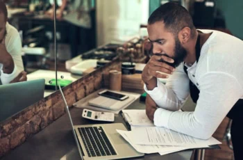 business owner taxes laptop forms calculator 1200
