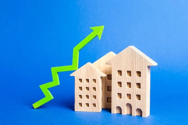 real estate reits blue background arrow 640